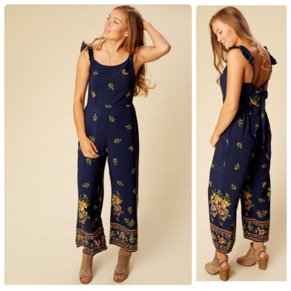 NWT Alter'd State wide leg jumpsuit with ruffle sleeve and bow tie back, size M